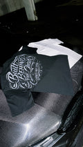 Graphic T-shirt with Built Behind the Chair and Earned Not Given lettering